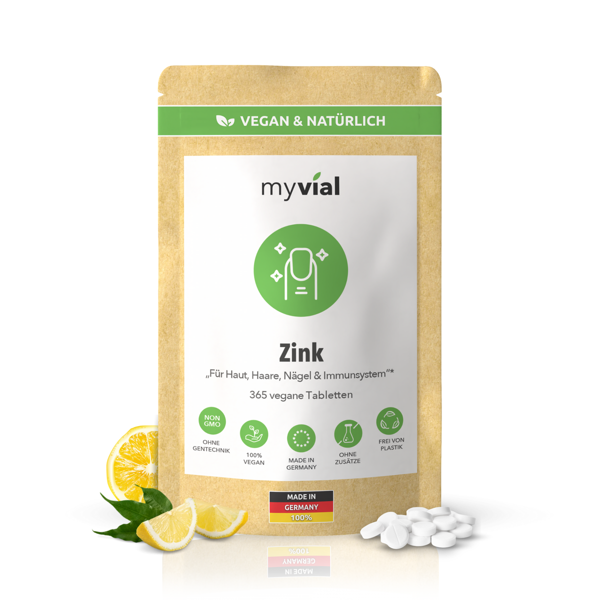 myvial Zink Tabletten in einer braunen Papiertüte mit Zitronenscheiben und Tabletten.